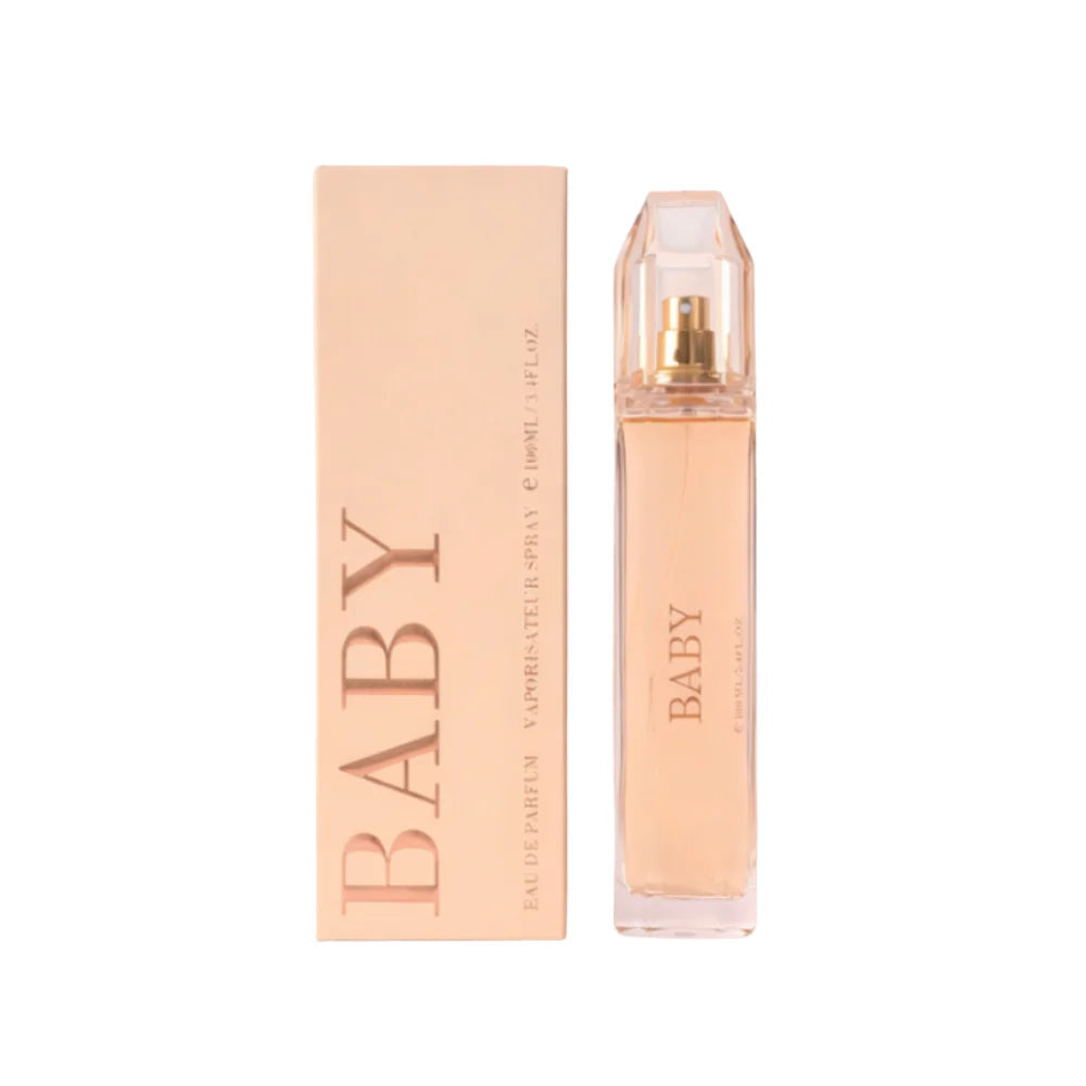 Baby 100ml Eau de Parfum in a sleek, tall clear glass bottle next to its elegant peach-colored minimalist box.