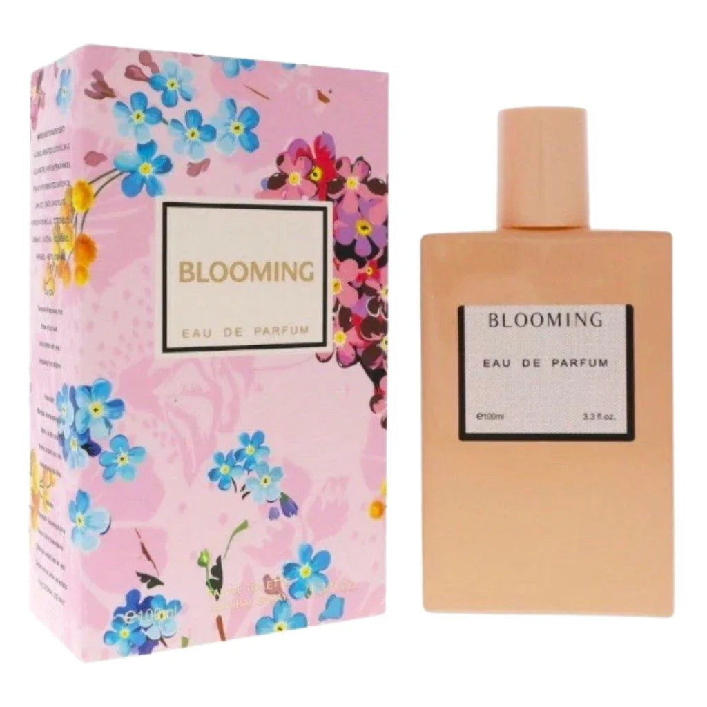 Blooming for Women 100ml Eau de Toilette in a minimalist peach-colored rectangular bottle next to its vibrant blue and pink floral patterned box.