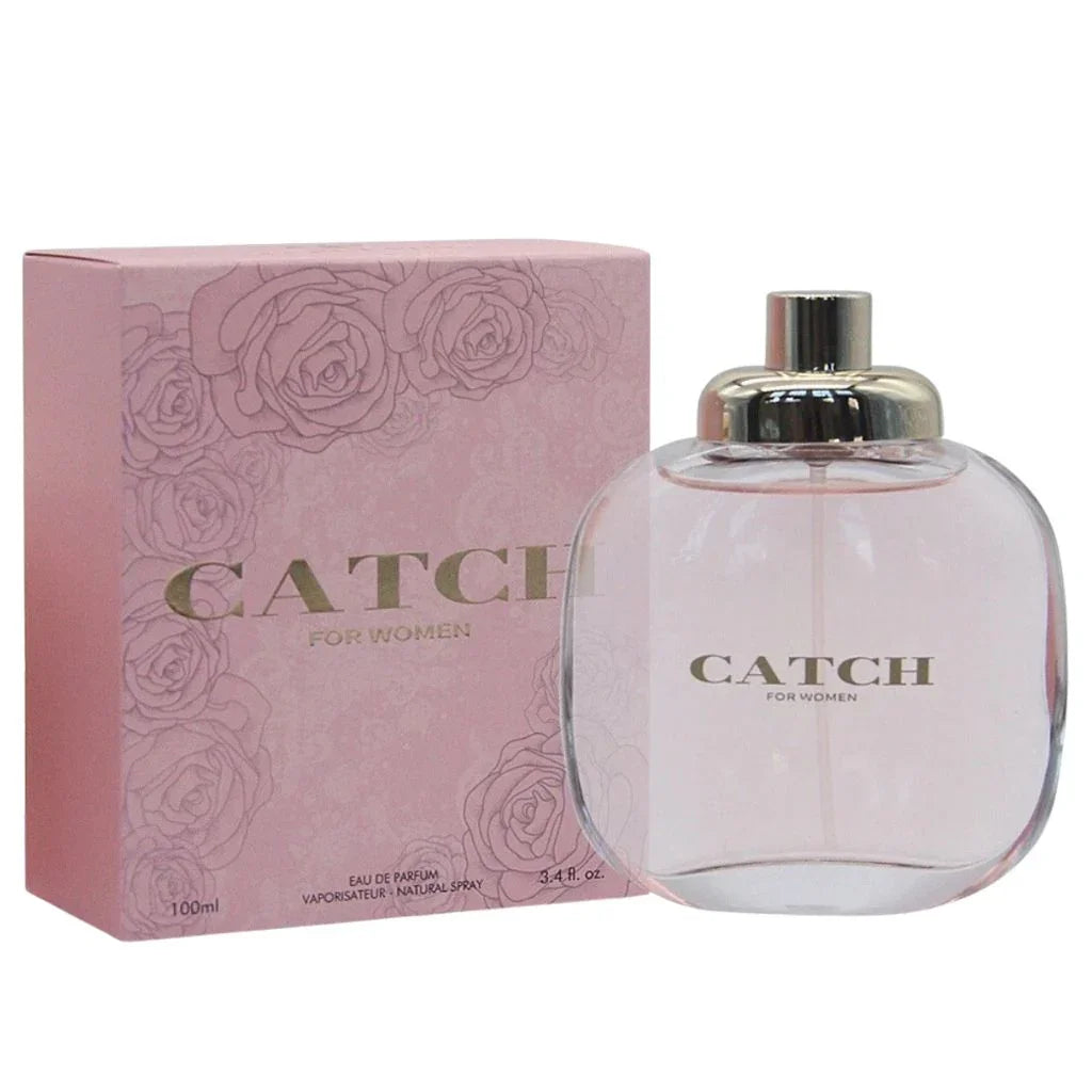 CATCH 100ml Eau de Parfum in a rounded clear bottle next to its pink box featuring embossed rose designs.