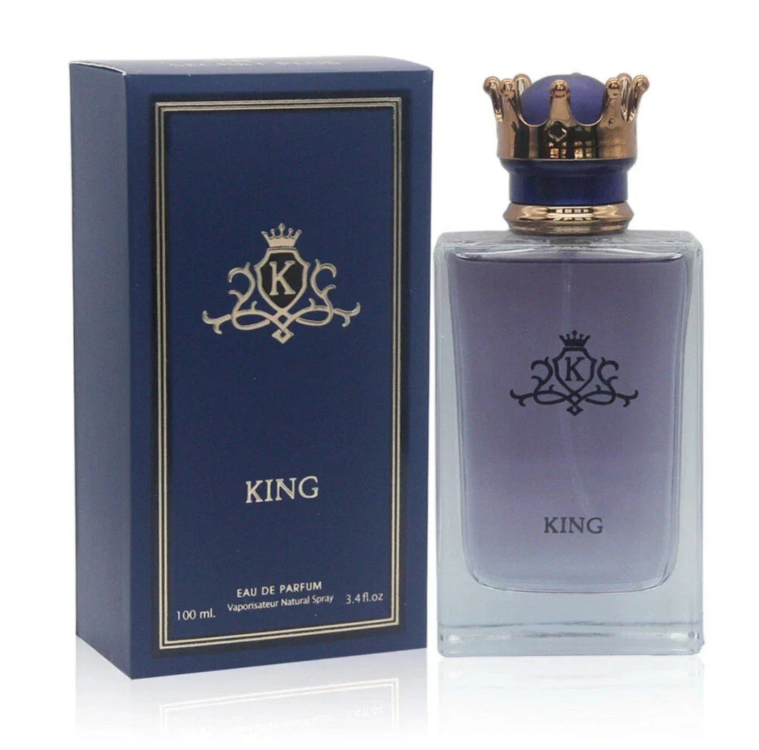 KING Eau de Parfum 3.4 fl oz clear glass bottle with a golden crown cap shown standing next to its premium navy blue and gold presentation box.