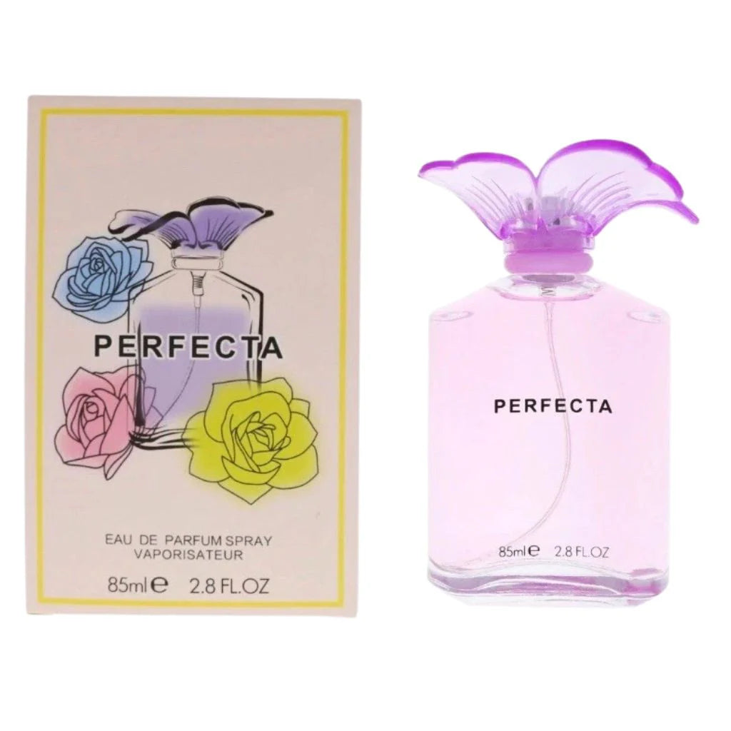 Perfecta 85ml Eau de Parfum in a light purple bottle with a butterfly-wing cap next to its colorful floral-patterned box.