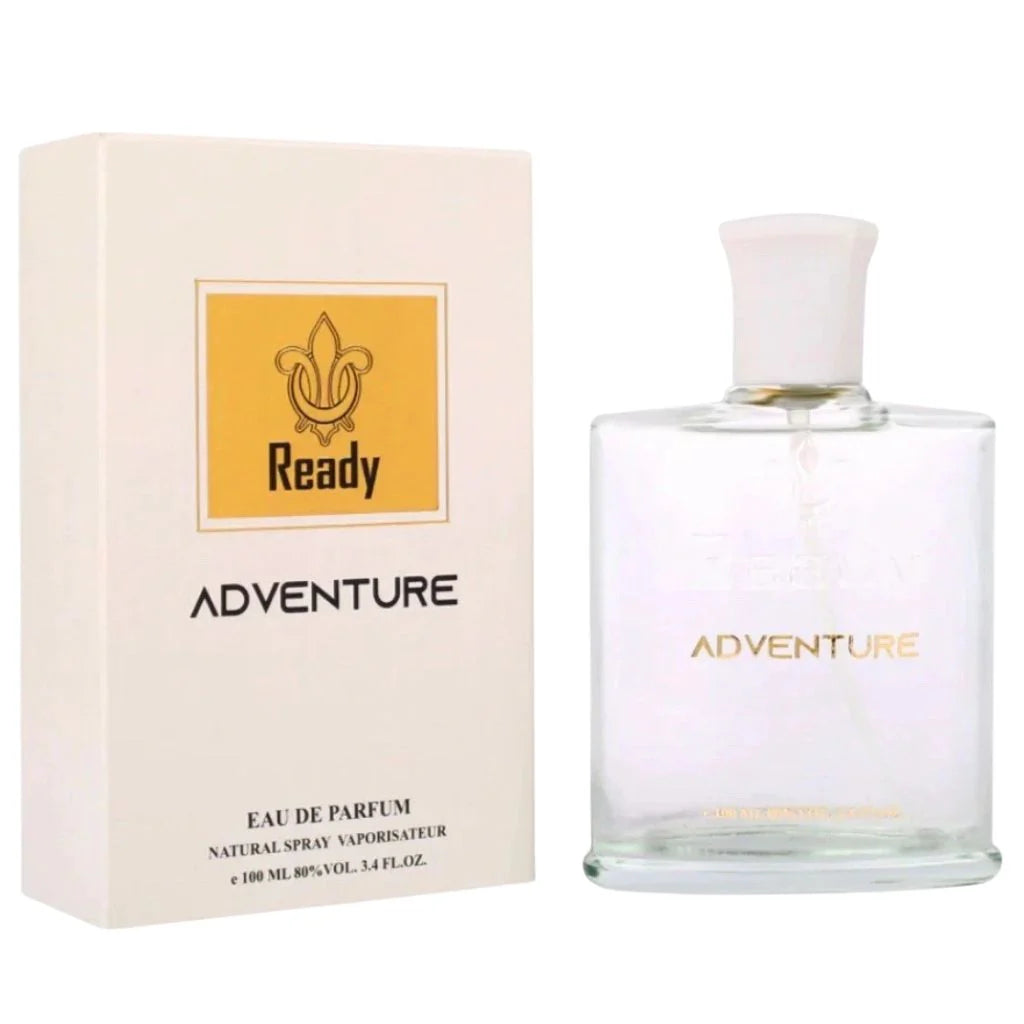 Ready Adventure 100ml Eau de Parfum bottle with gold labeling next to its matching white and gold retail box featuring spicy and woody notes.
