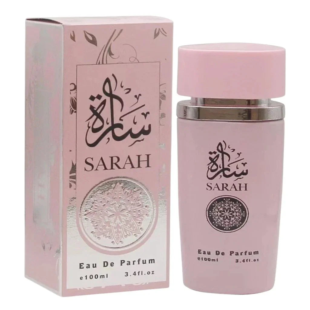 Sarah for Women 100ml Eau de Parfum in a matte pink bottle next to its matching pink retail box with silver accents.