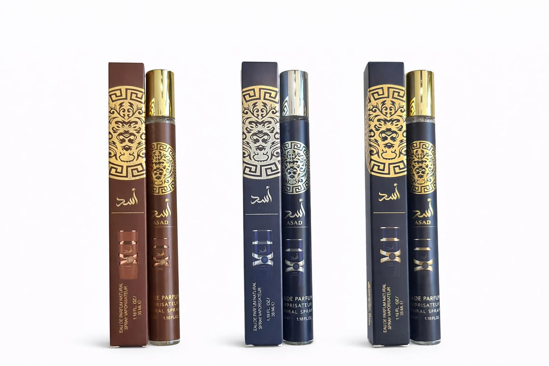 Three luxury 35ml travel size fragrances for men in individual brown and blue embossed gold presentation boxes, showcasing sleek Eau de Parfum spray atomizers.