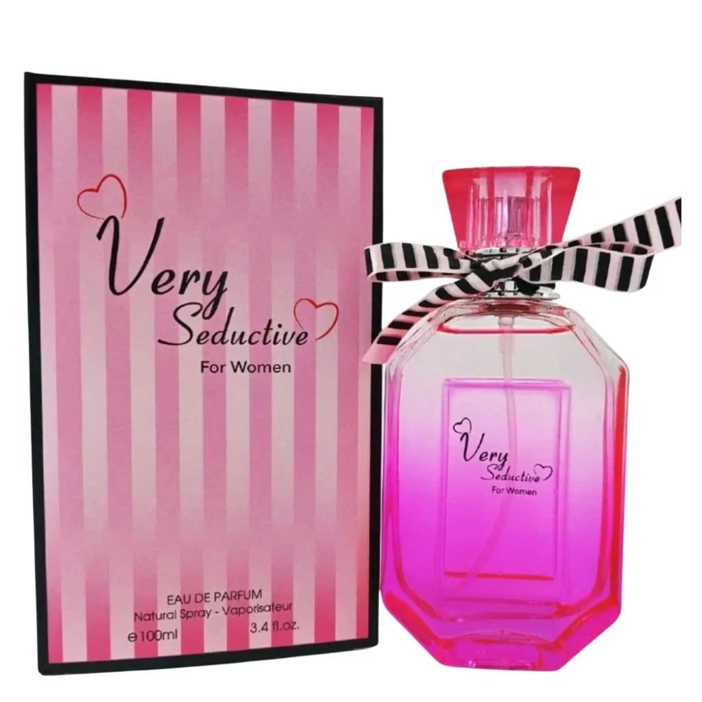 Very Seductive 100ml Eau de Parfum in a vibrant pink bottle with a black and white striped bow next to its pink striped box.