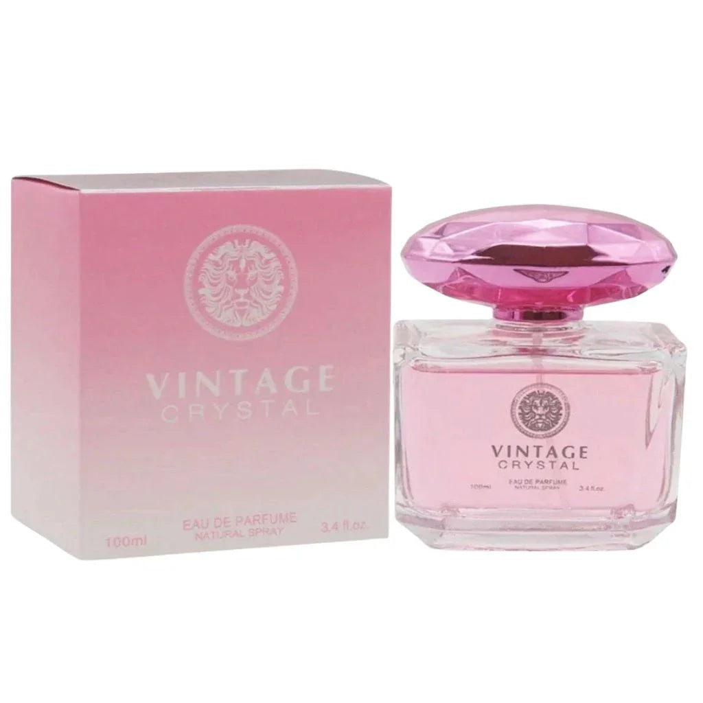 Vintage Crystal 100ml Eau de Parfum in a clear rectangular bottle with a pink jewel-style cap next to its pink retail box.