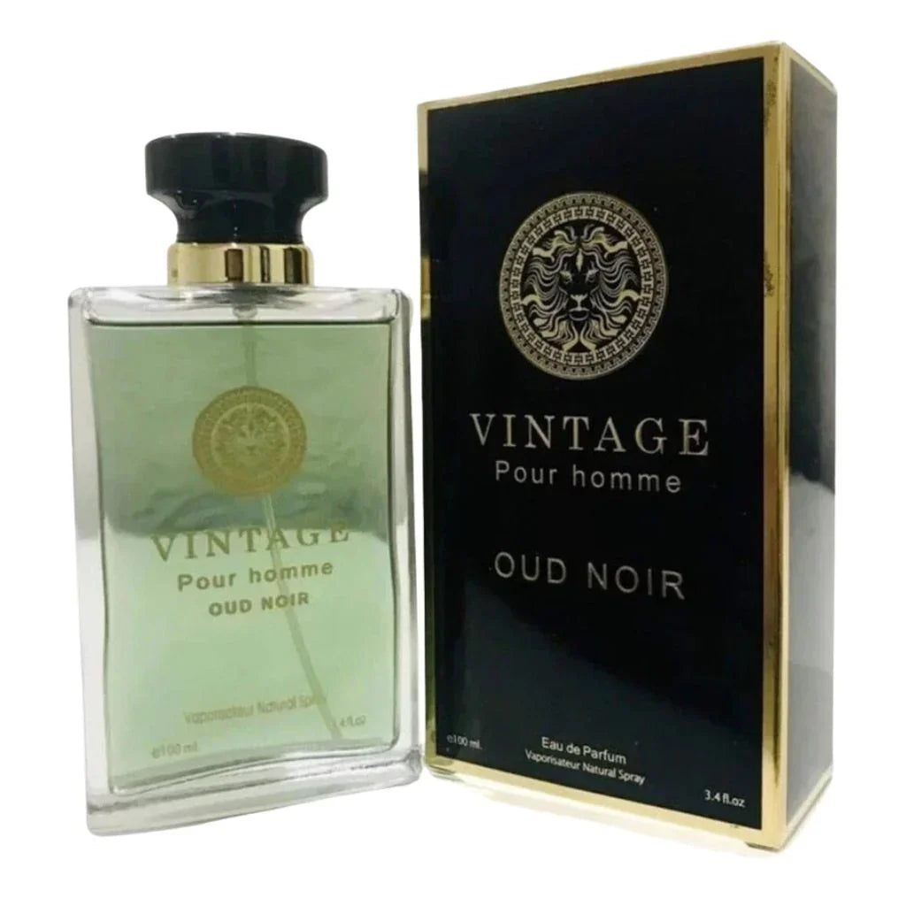 Vintage Oud Noir Pour Homme 3.4 oz clear glass bottle with light green juice and a gold lion emblem, standing next to its matching black and gold presentation box.