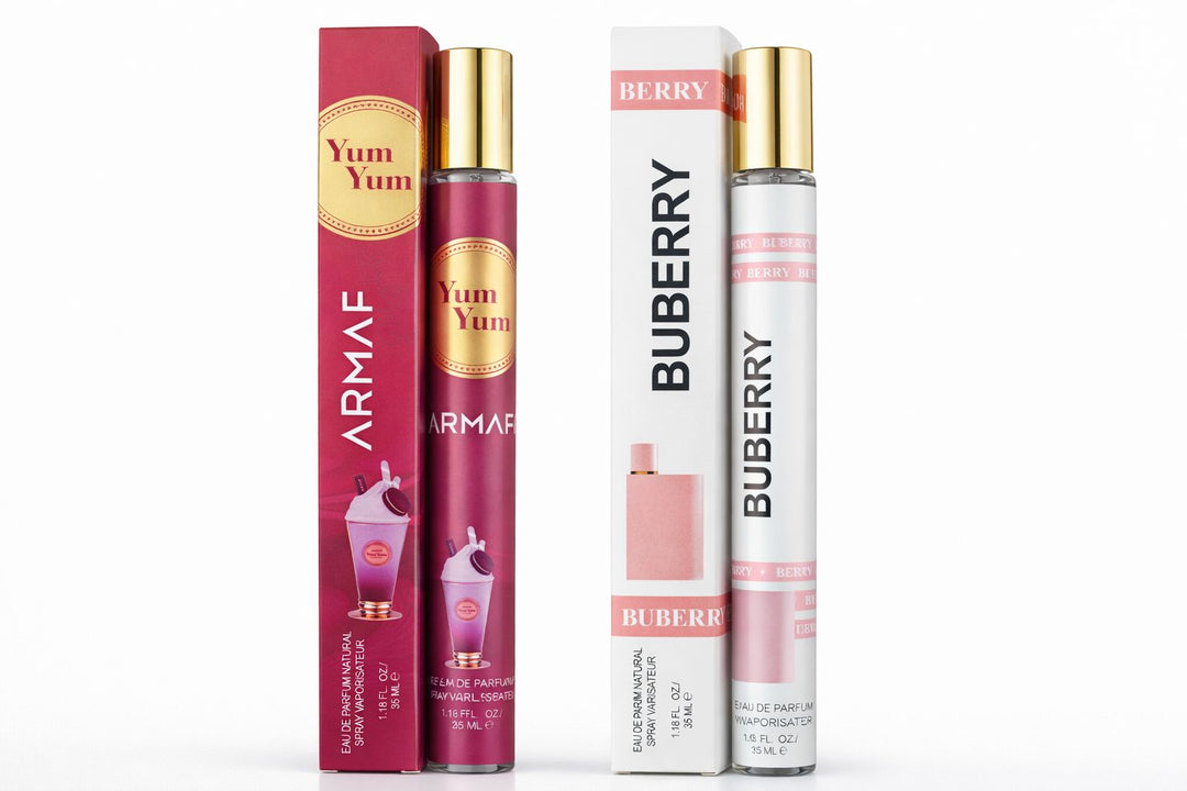 Women’s Luxury Travel Perfume 2 Pack showcasing a 35ml Armaf Yum Yum bottle in dark pink and a Buberry Berry bottle in white next to their custom gift boxes.