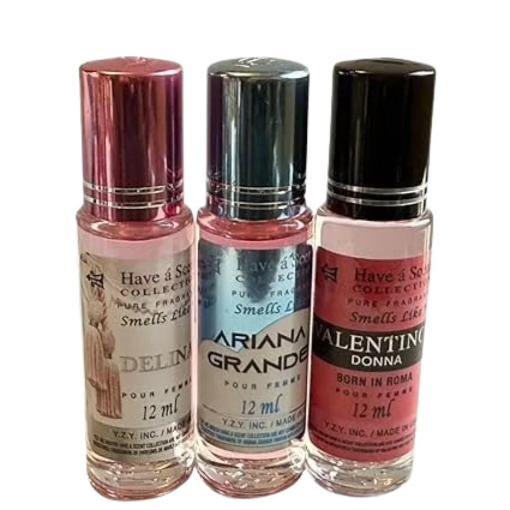 three metallic capped ten milliliter rollerball bottles containing assorted women&